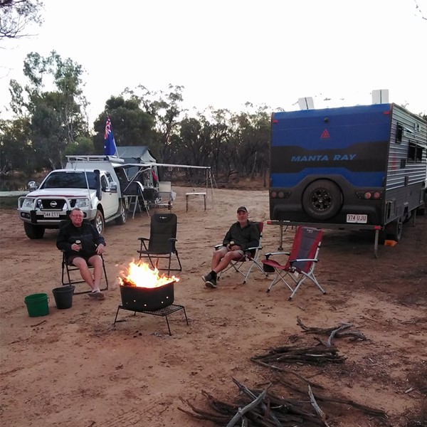 caravaners enjoying a fire